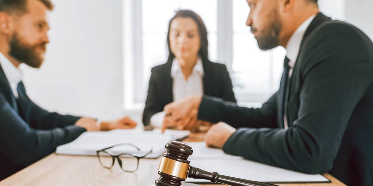 What is Discussed at an Initial Status Conference?